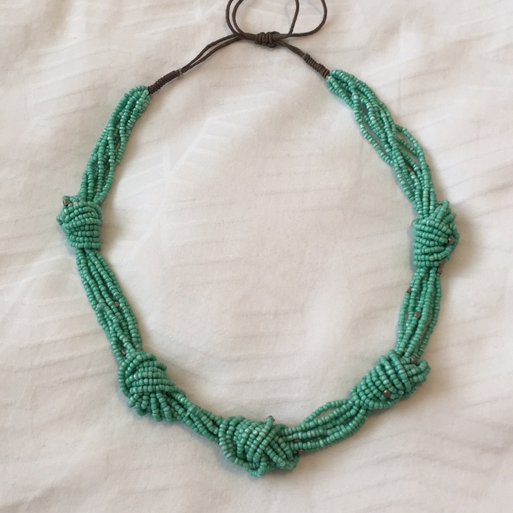 Turquoise Beaded Necklace with suede ties. EUC